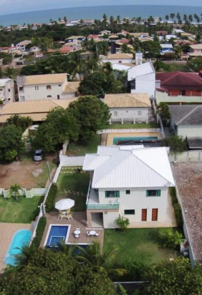 Mansão Guarajuba com acesso exclusivo ao rio e mar Jacuípe
